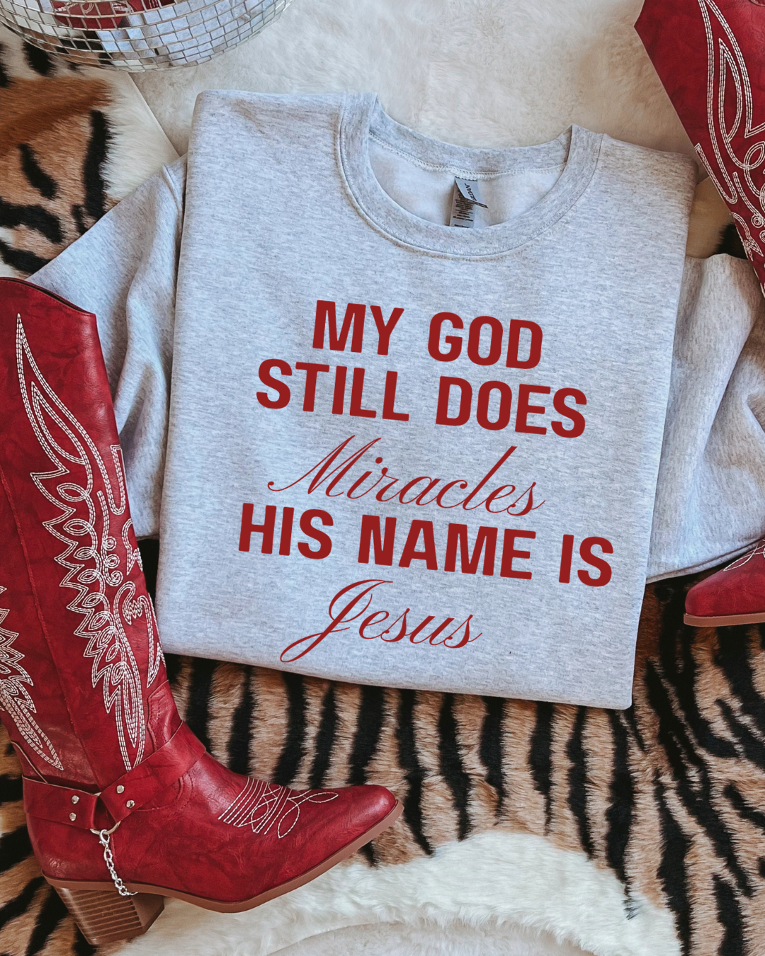 MY GOD STILL DOES MIRACLES CREWNECK
