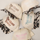 MAKE HEAVEN ROWDY Embroidered Cow Print Brim Trucker Hat