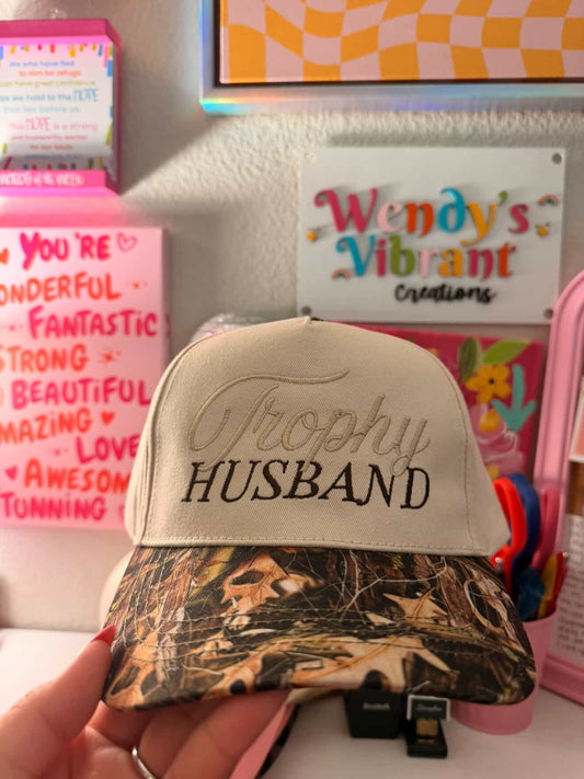 TROPHY HUSBAND