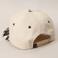 MAKE HEAVEN ROWDY Embroidered Cow Print Brim Trucker Hat