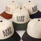 KEEP PRAYIN' Two-toned Suede Canvas Trucker Hat: OGN / One Size